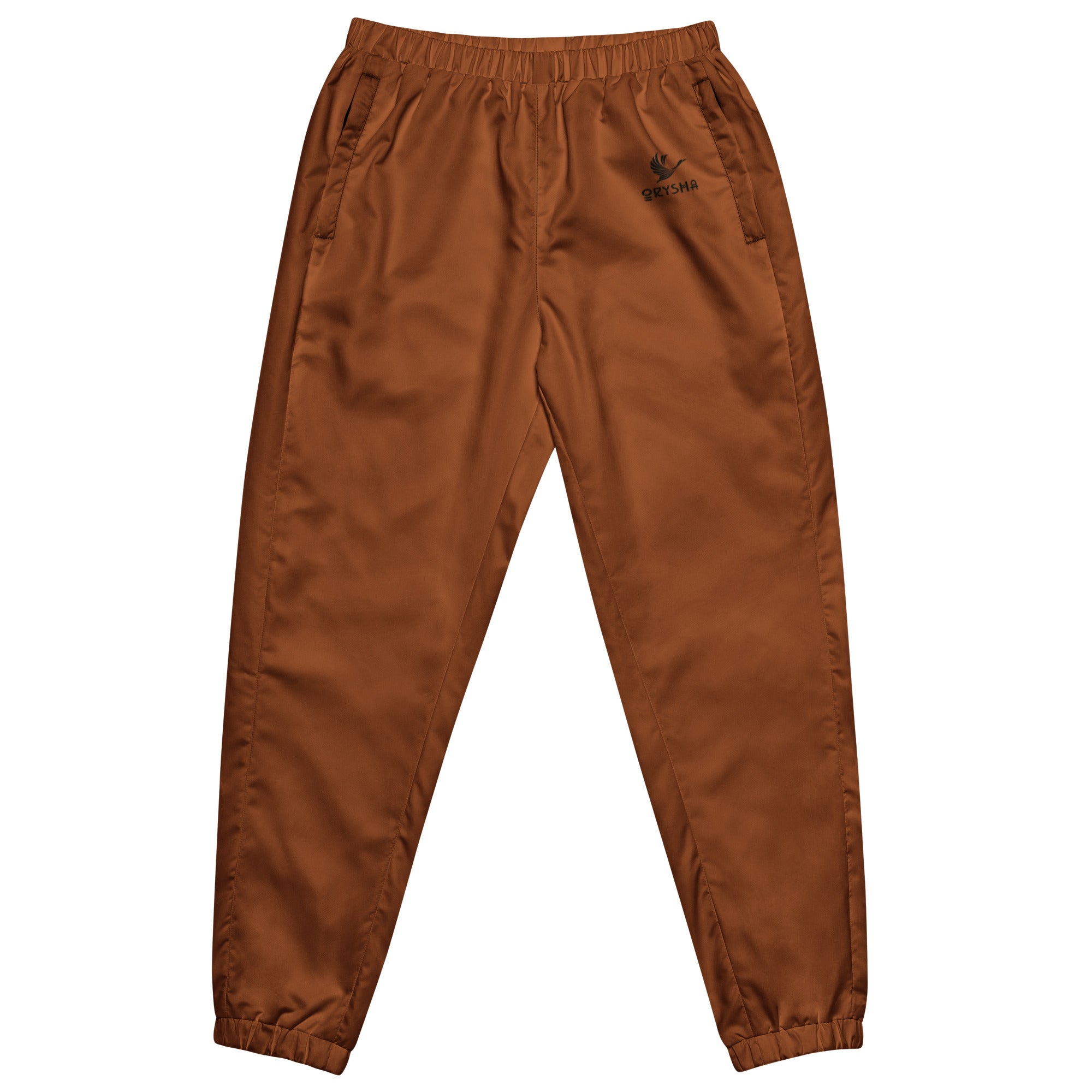 Orysha men’s saddle brown  track pants featuring lightweight water-resistant fabric, mesh lining, elastic cuffs, and a minimalist design.