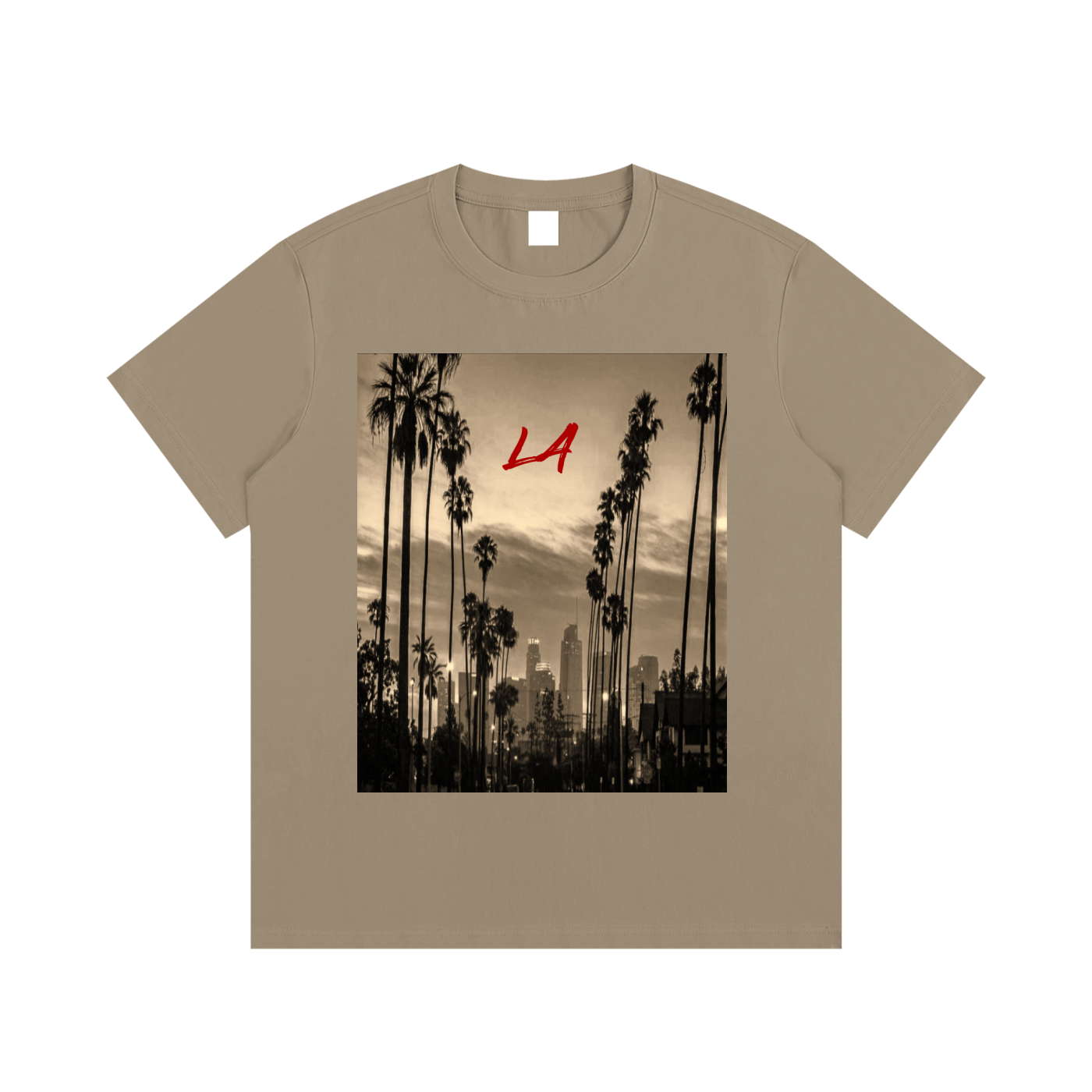 Beige t-shirt with a graphic of palm trees and a city skyline on a white background