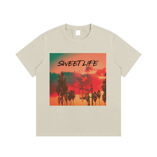 Beige t-shirt with 'Sweet Life' graphic featuring palm trees and a sunset.
